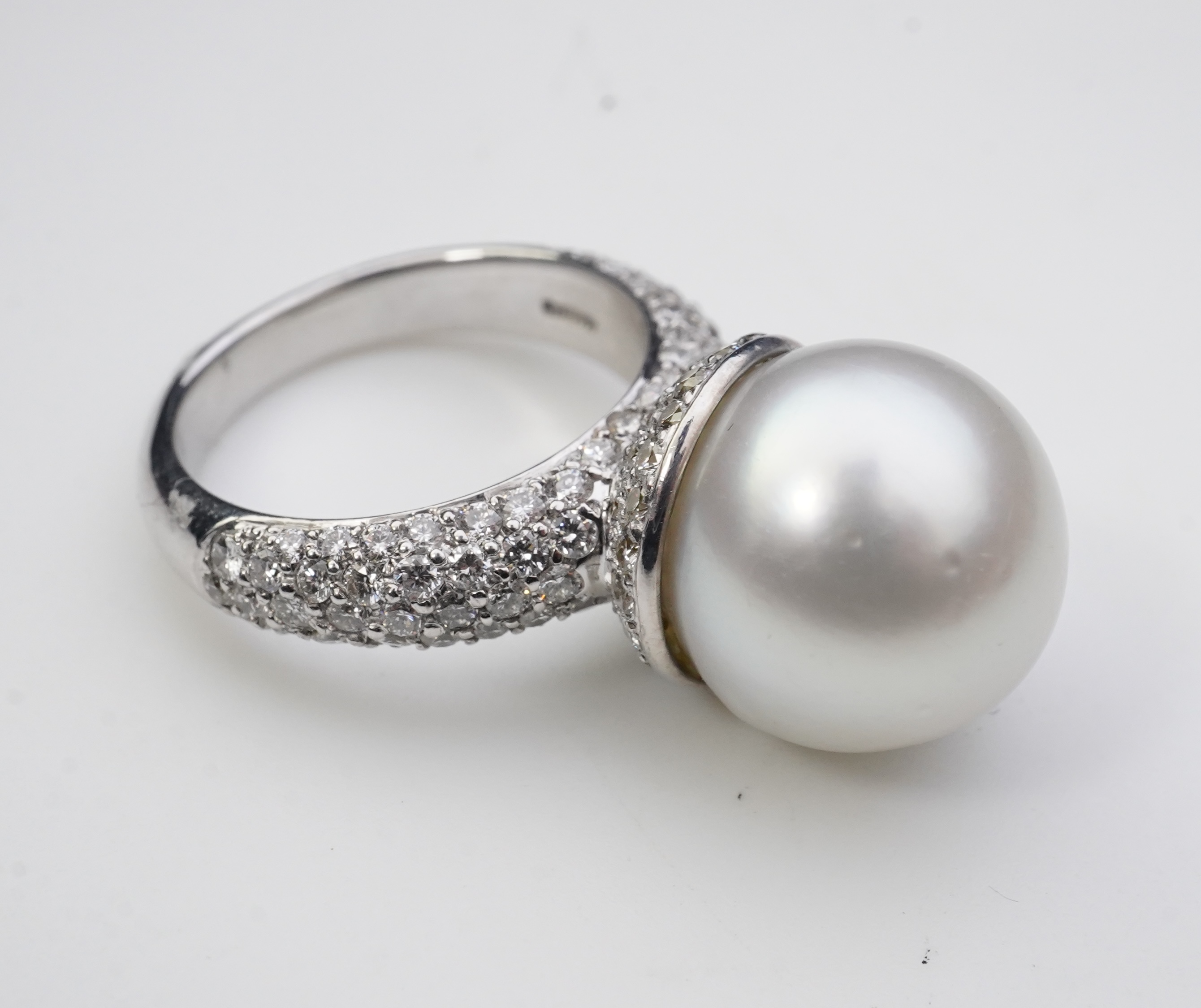 A South Sea cultured pearl and diamond ring